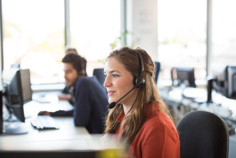 Woman working in a call center.