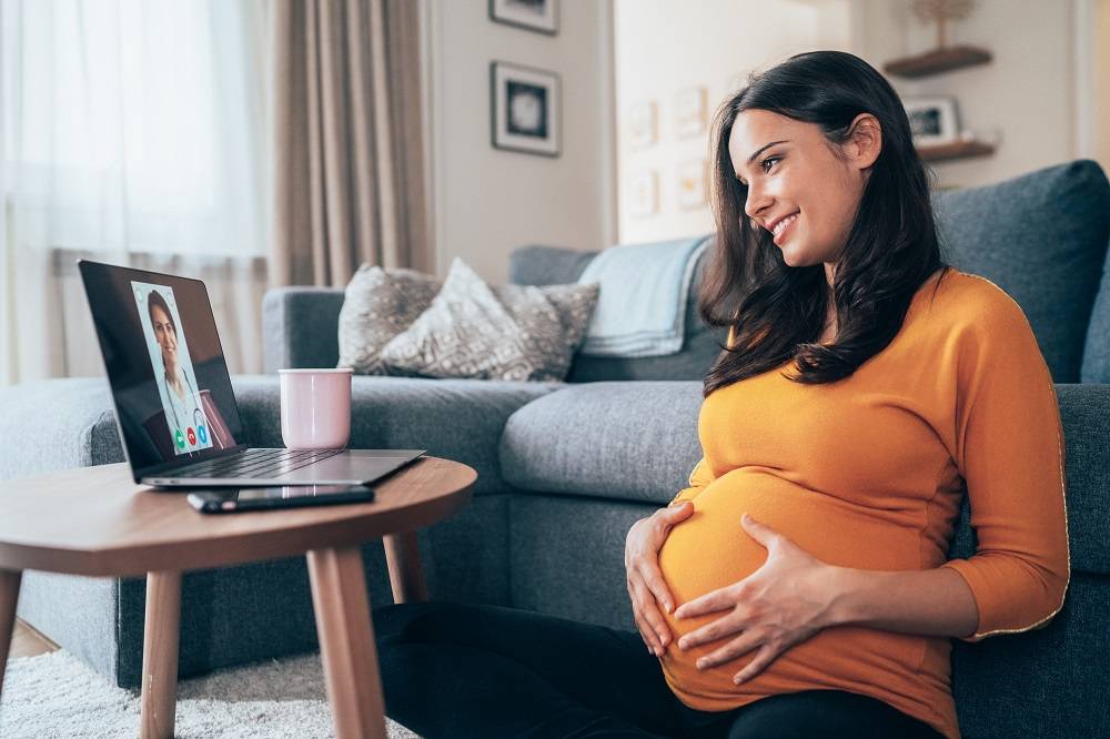 Pregnant woman at a telehealth appointment