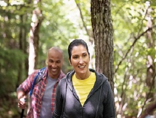 Family walking in woods