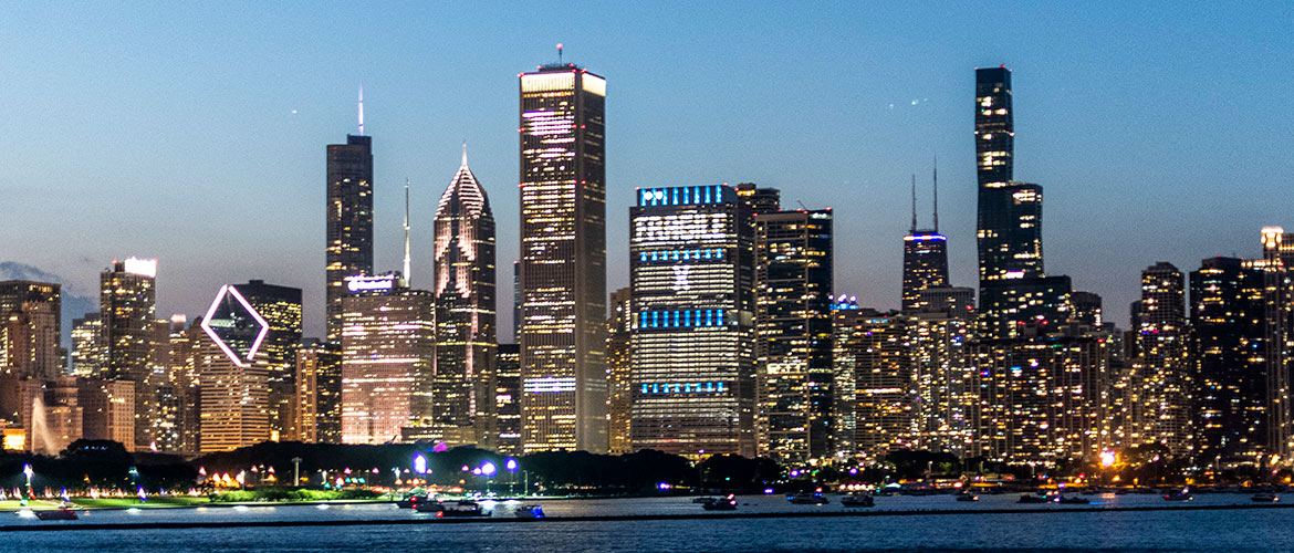 BCBSIL headquarters at night with lighting spelling Fragile X