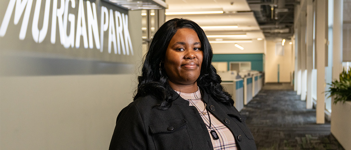 A woman poses for a photo