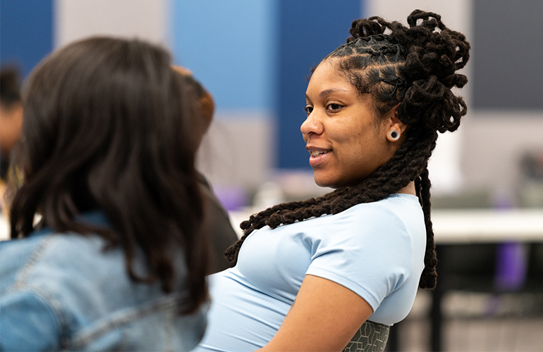 Woman participates in a group discussion for pregnant woman