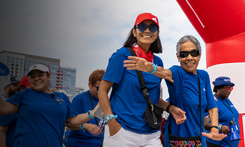 Employees and community members celebrating at Heart Walk